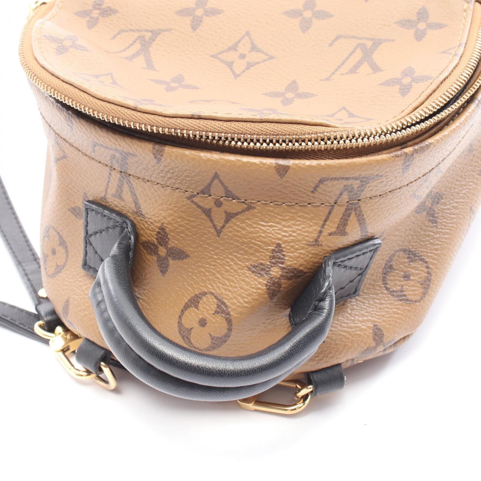 Louis Vuitton Brown Coated Canvas Leather Backpack (Pre-Owned)