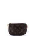 Pochette Accessoires Monogram Canvas Mini