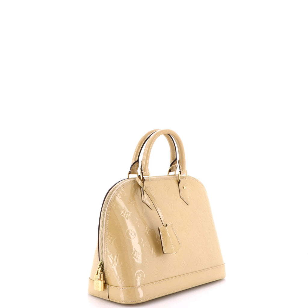 Alma Handbag Monogram Vernis PM