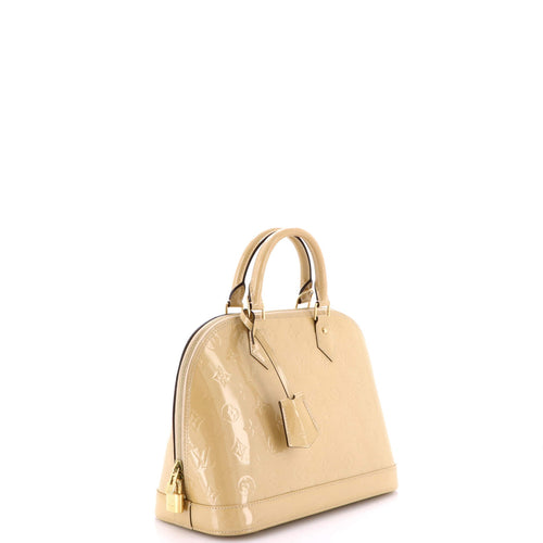 Alma Handbag Monogram Vernis PM