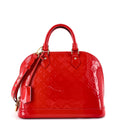 Alma Handbag Monogram Vernis PM