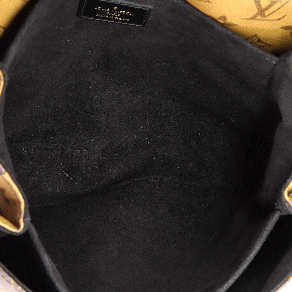 Pochette Metis Reverse Monogram Canvas