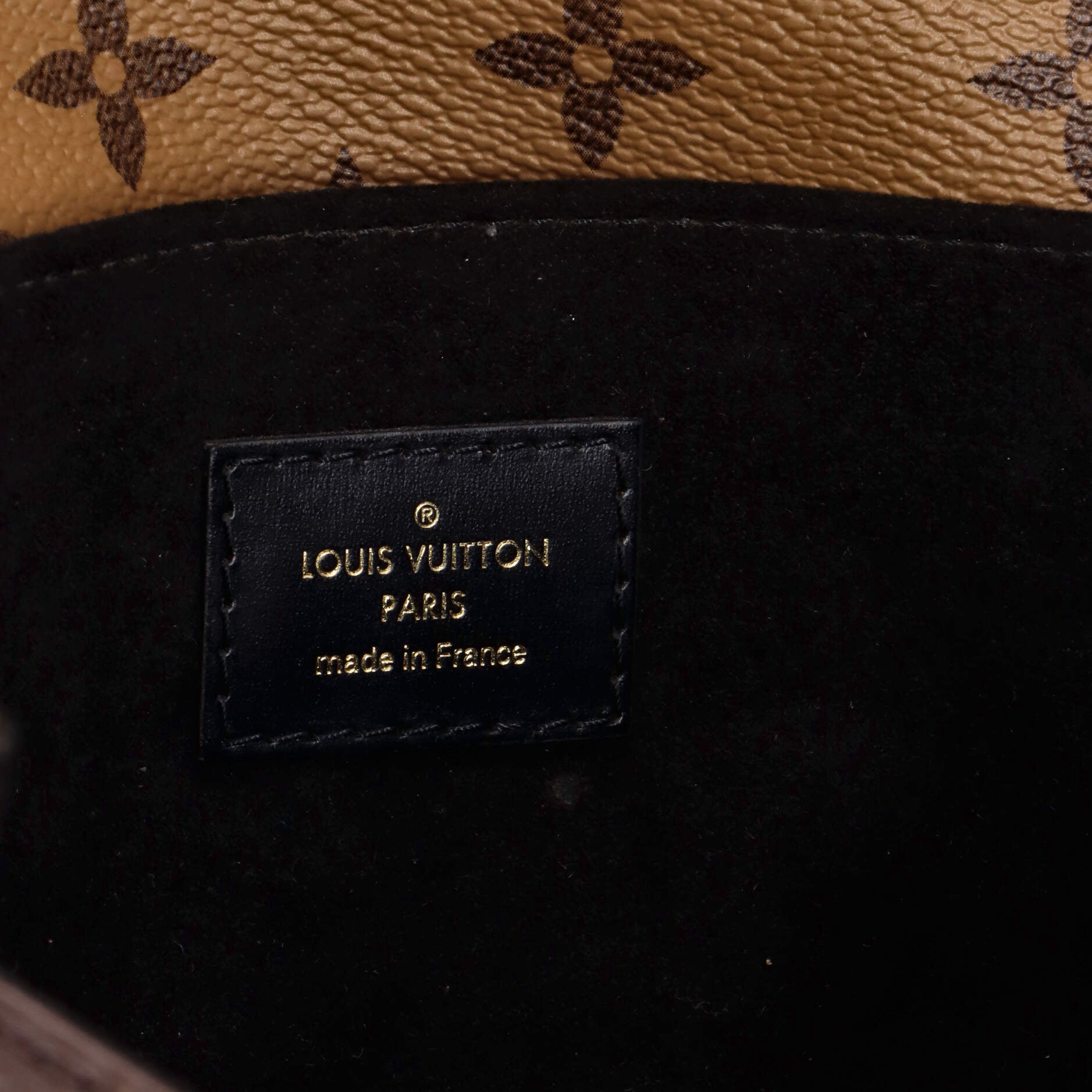 Pochette Metis Reverse Monogram Canvas