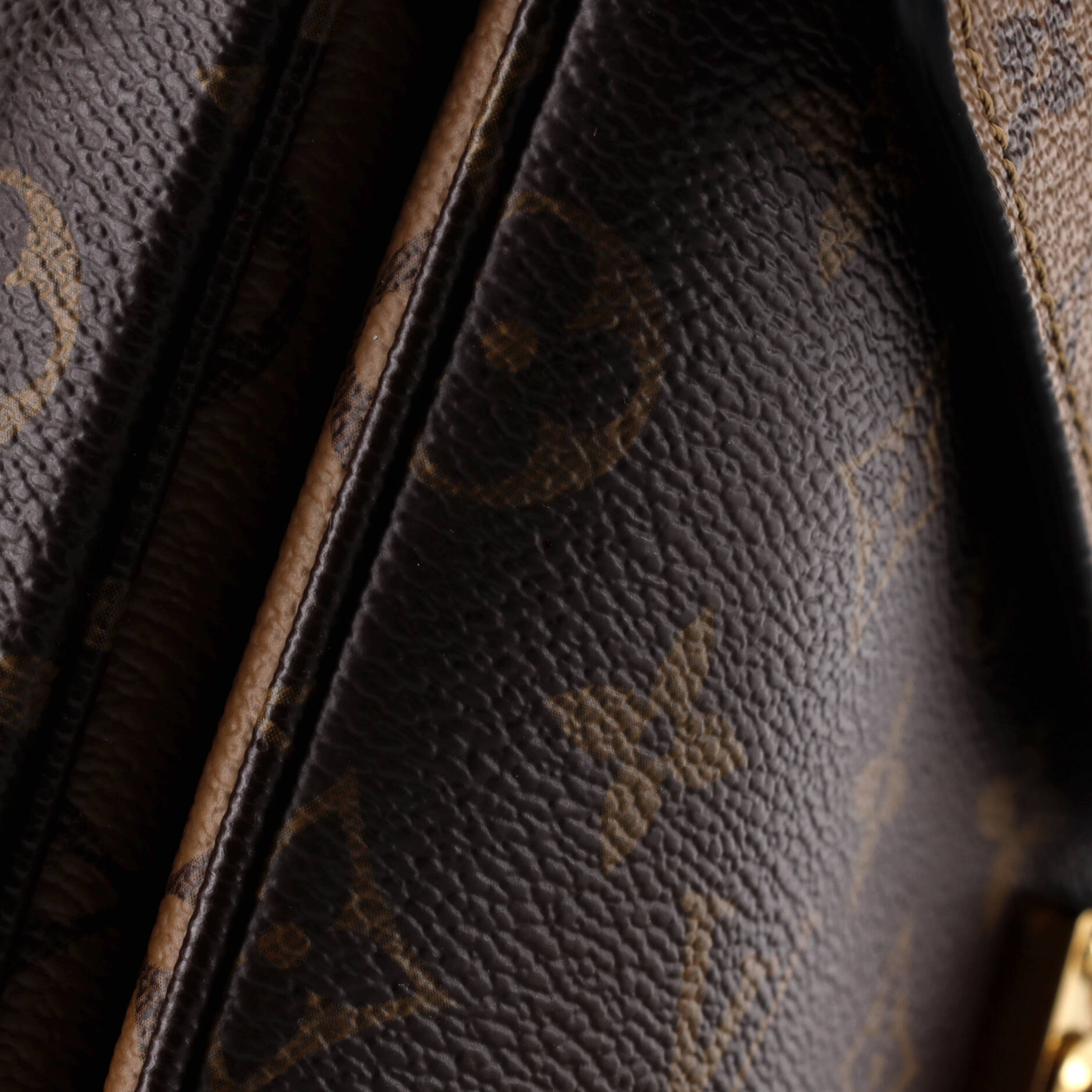 Pochette Metis Reverse Monogram Canvas