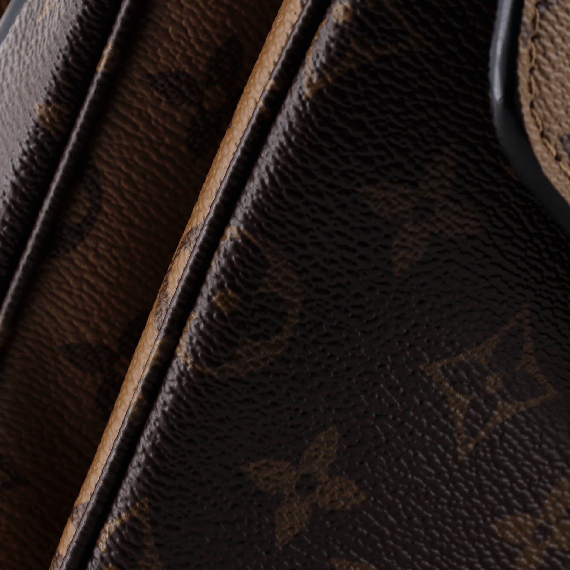 Pochette Metis Reverse Monogram Canvas