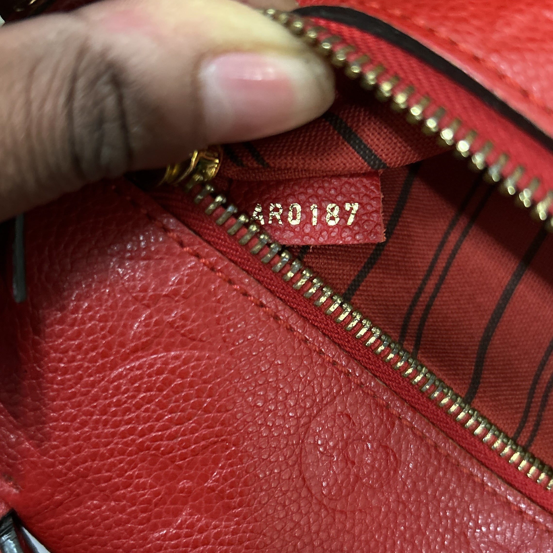 Pochette Metis Monogram Empreinte Leather