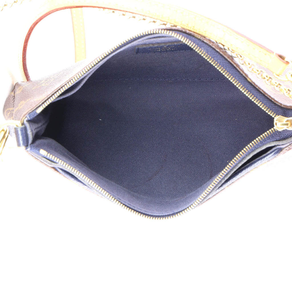 Pallas Clutch Monogram Canvas with Leather