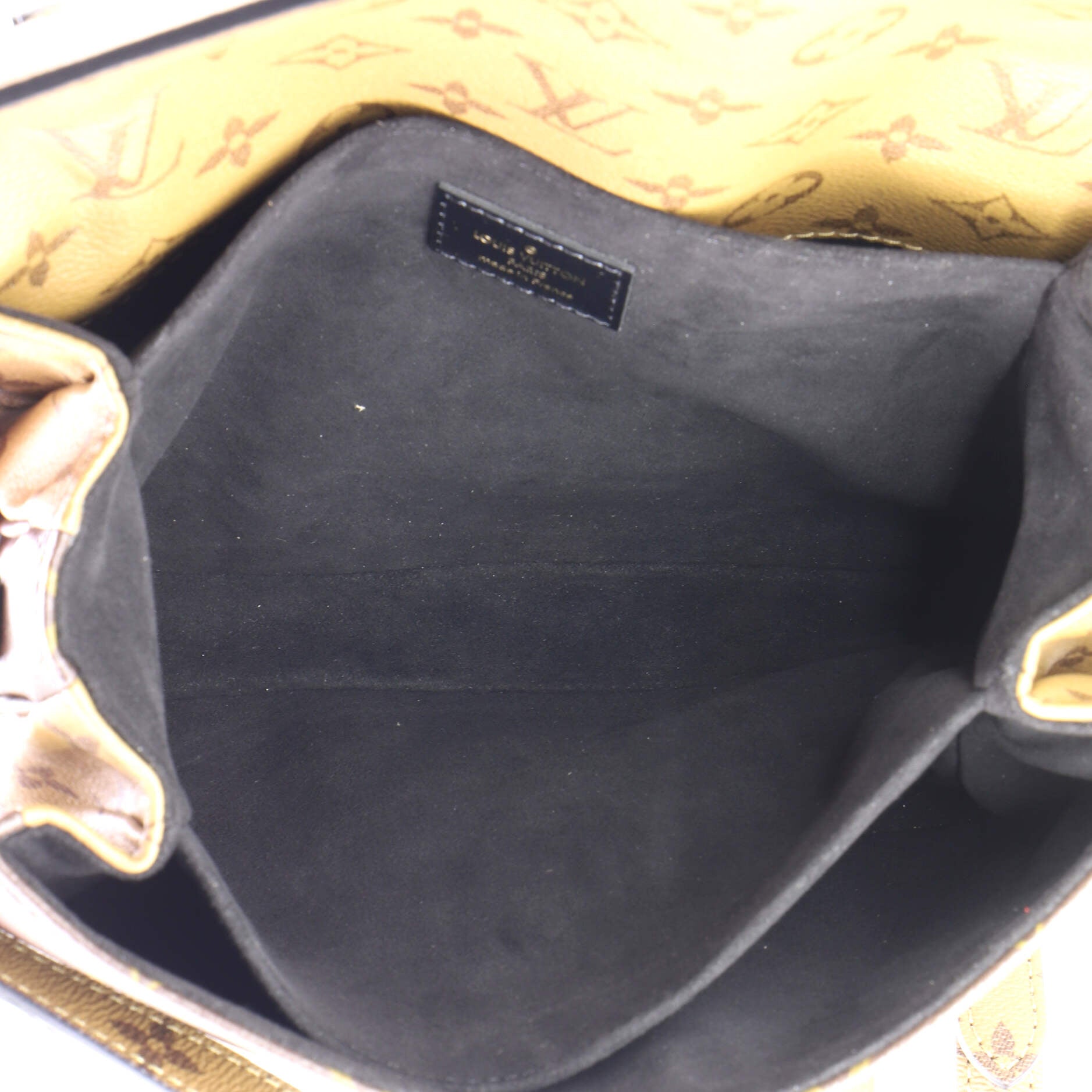 Pochette Metis Reverse Monogram Canvas