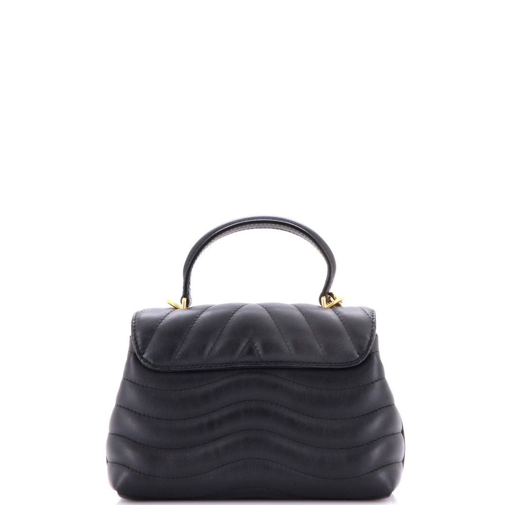 New Wave Hold Me Top Handle Bag Quilted Leather