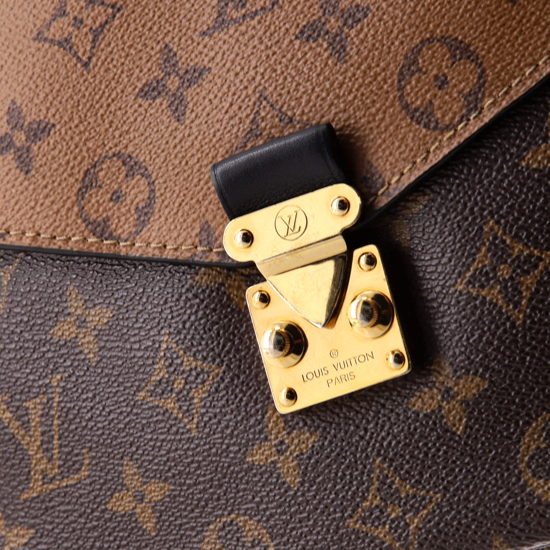 Pochette Metis Reverse Monogram Canvas