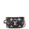 Multi Pochette Accessoires Bicolor Monogram Empreinte Giant