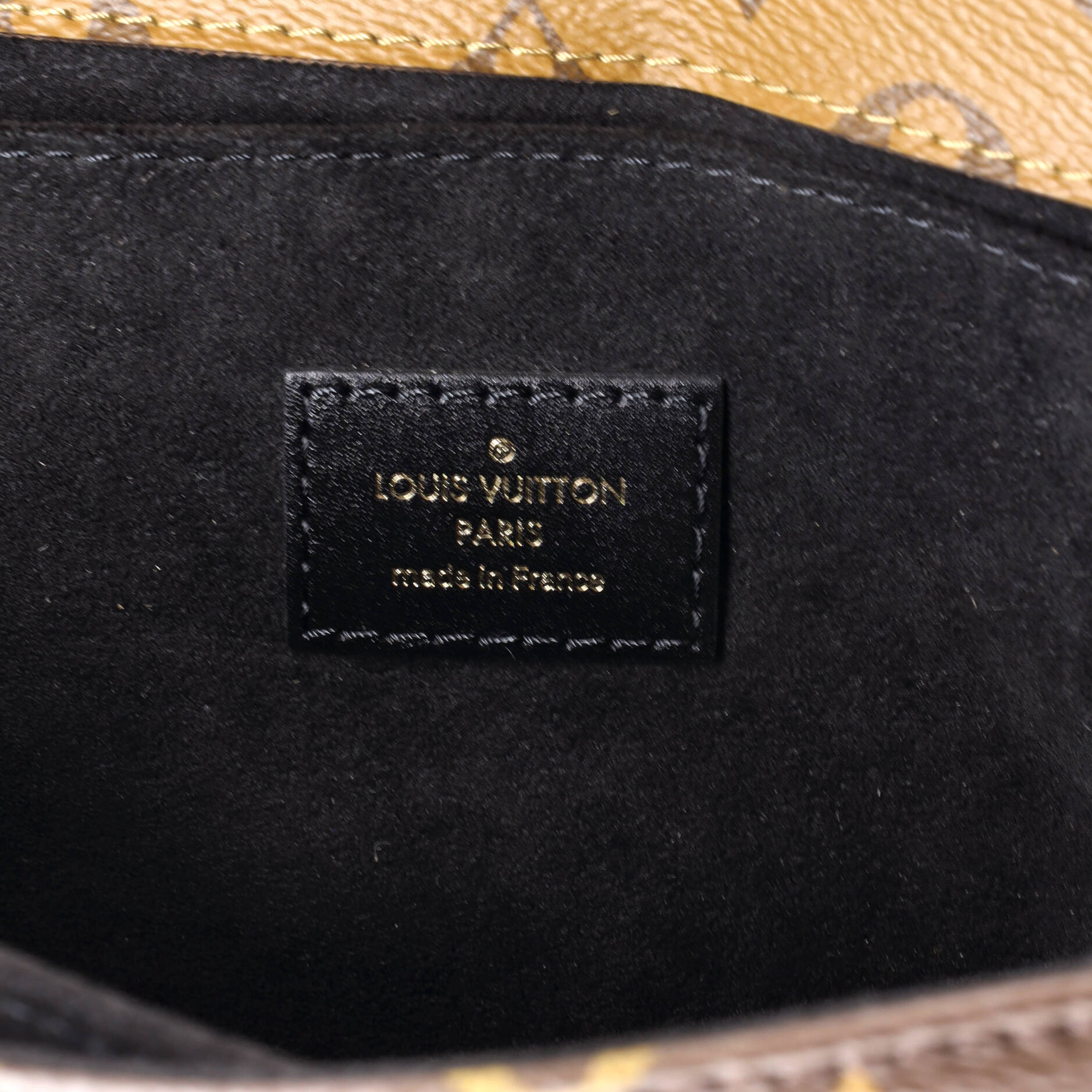 Pochette Metis Reverse Monogram Canvas