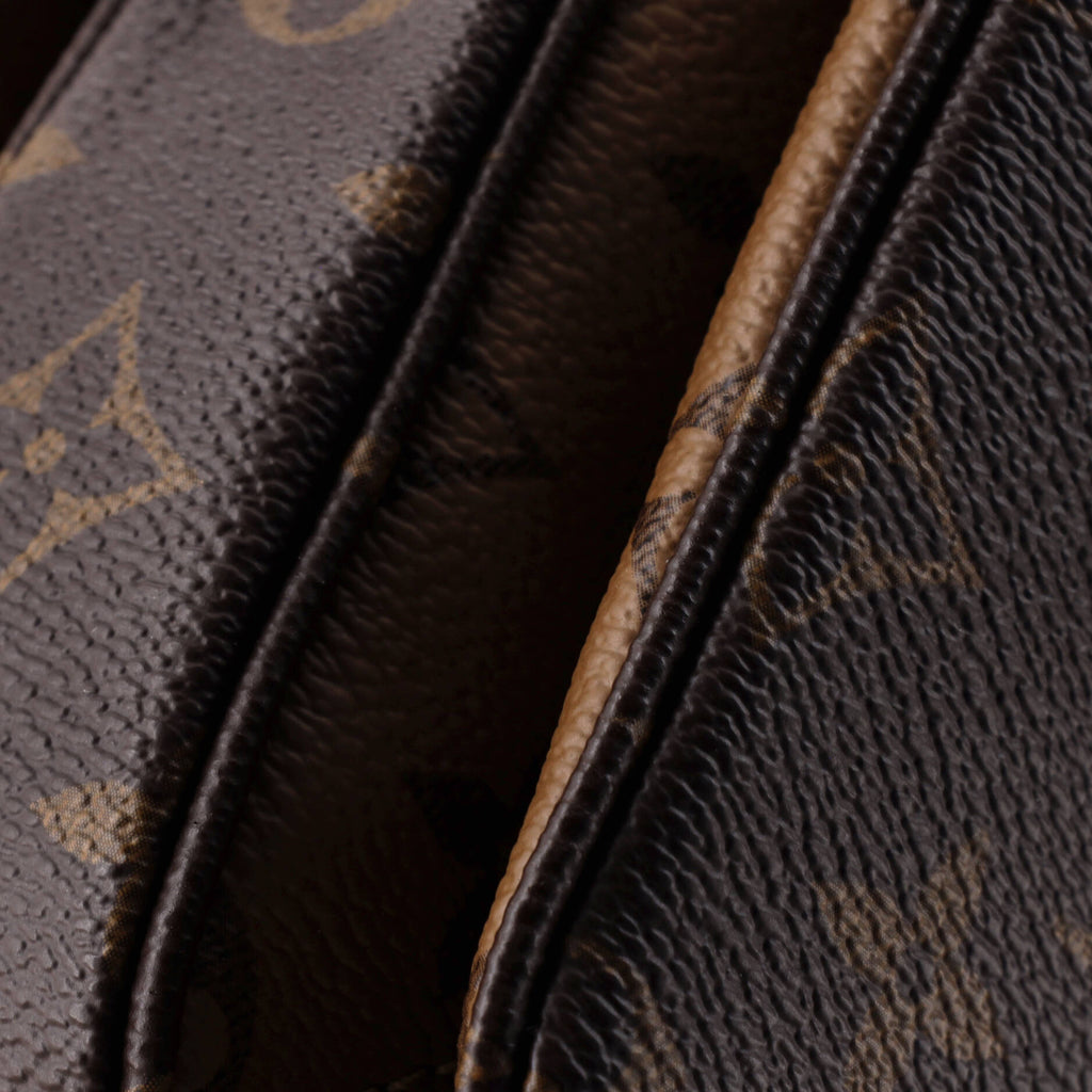 Pochette Metis Reverse Monogram Canvas