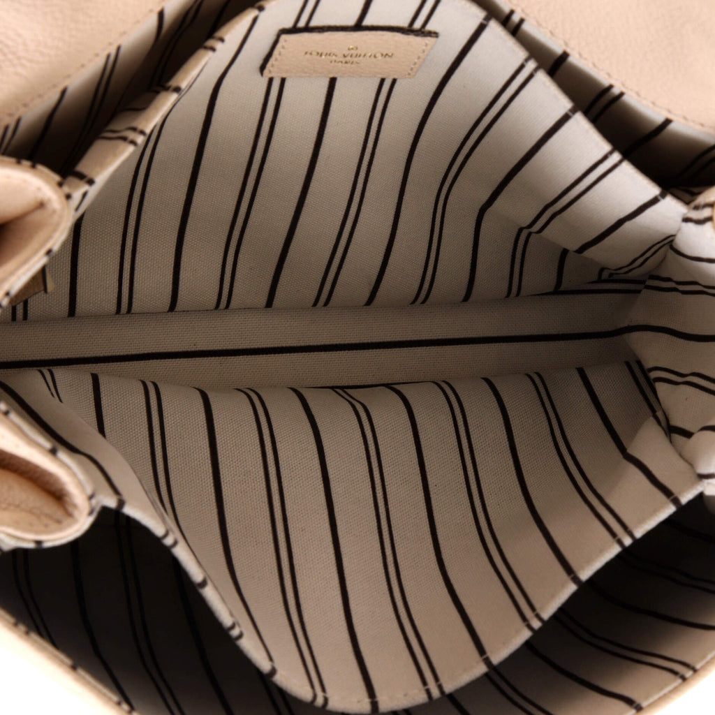 Pochette Metis Monogram Empreinte Leather