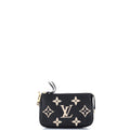 Pochette Accessoires Bicolor Monogram Empreinte Giant Mini