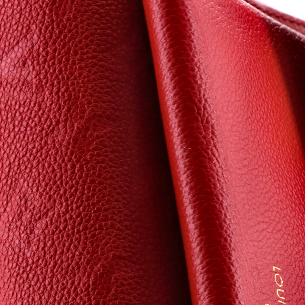 Vavin Handbag Monogram Empreinte Leather PM