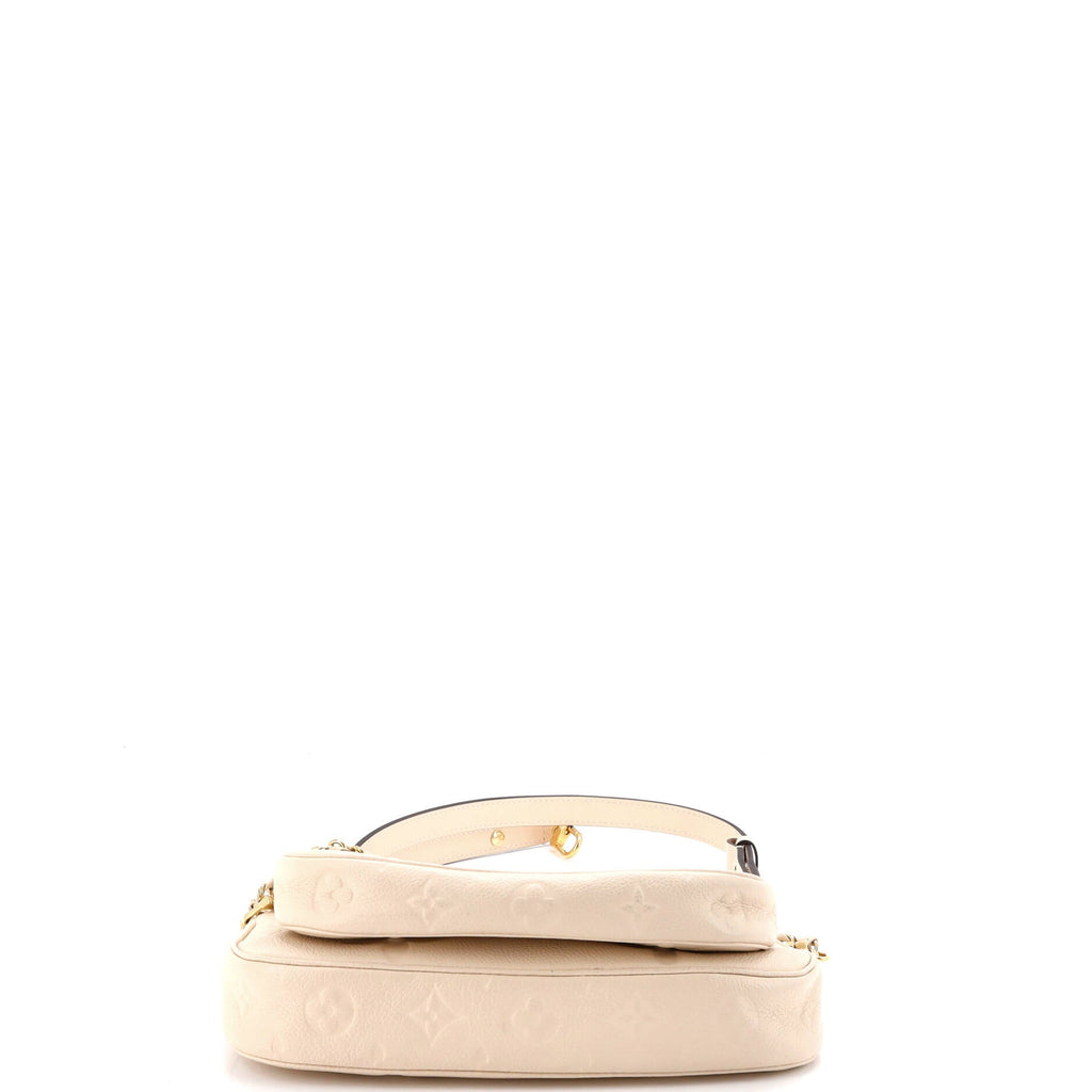 Multi Pochette Accessoires Monogram Empreinte Giant