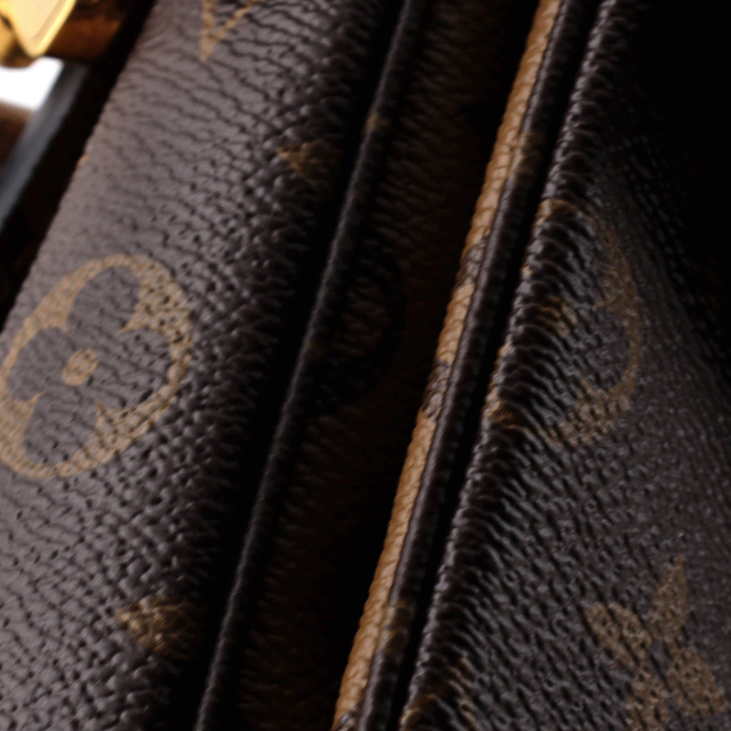 Pochette Metis Reverse Monogram Canvas