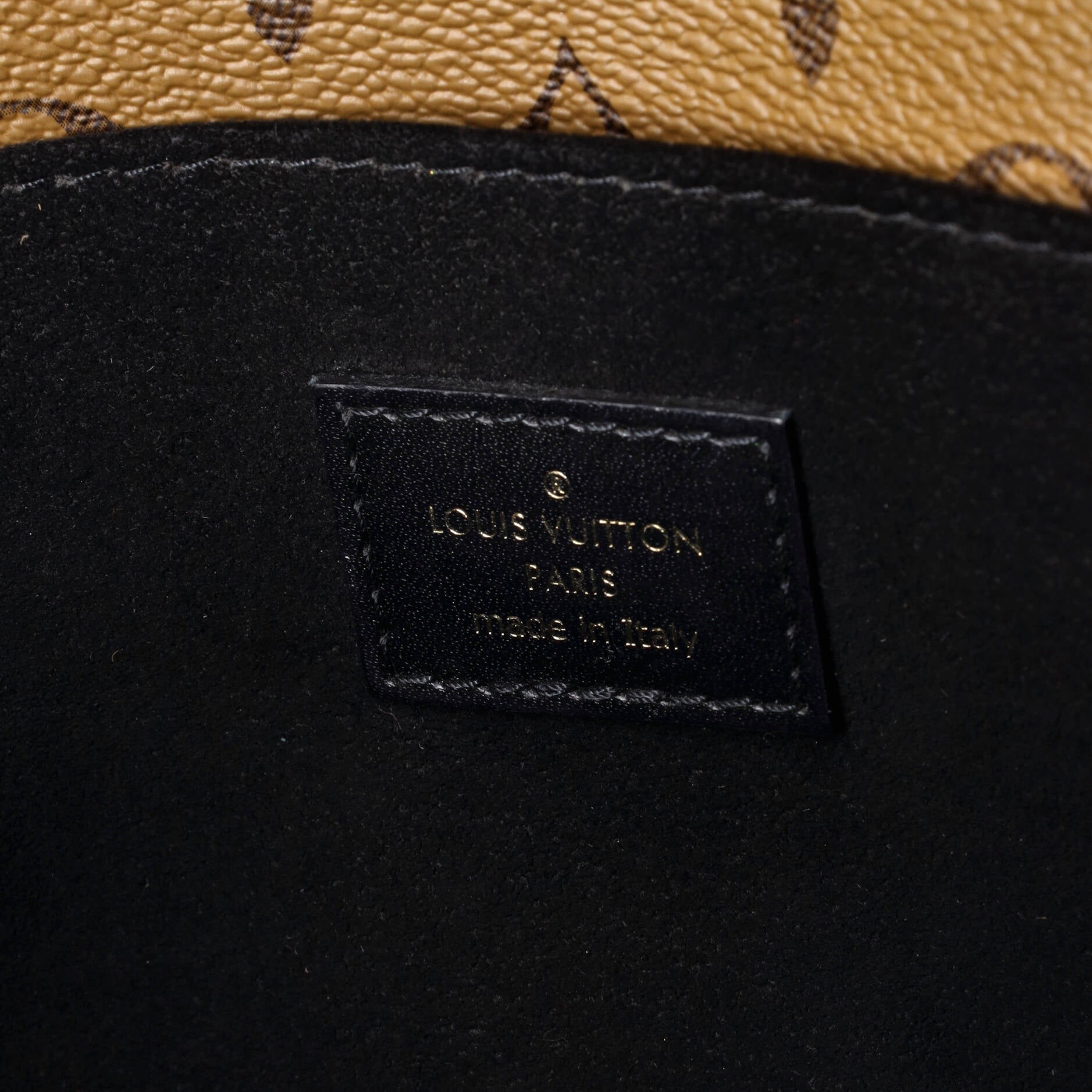 Pochette Metis Reverse Monogram Canvas