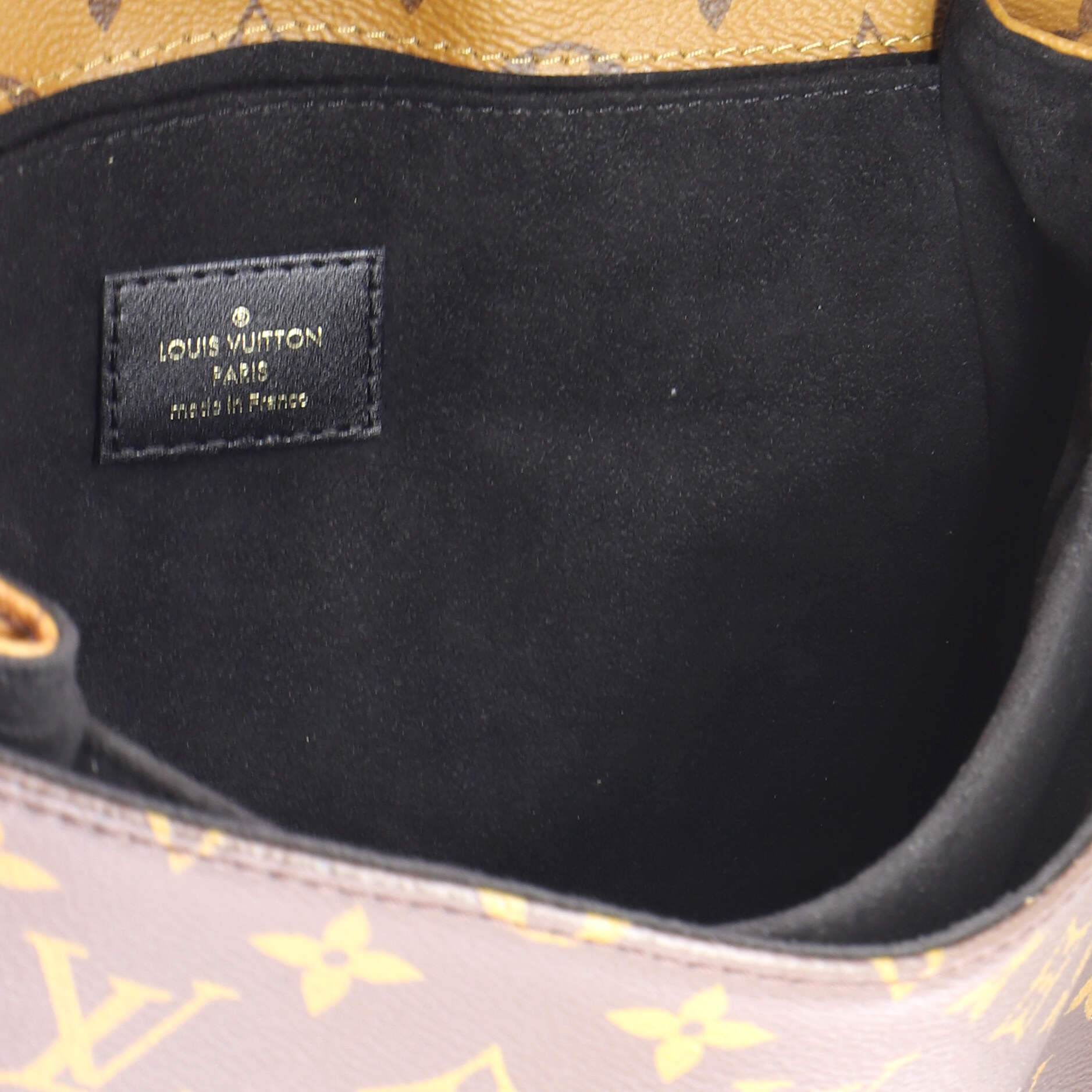 Pochette Metis Reverse Monogram Canvas