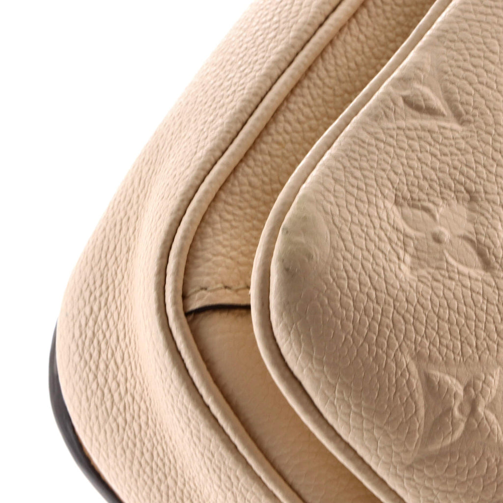 Pochette Metis Monogram Empreinte Leather