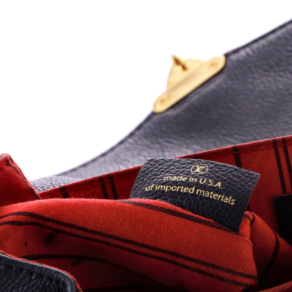 Pochette Metis Monogram Empreinte Leather