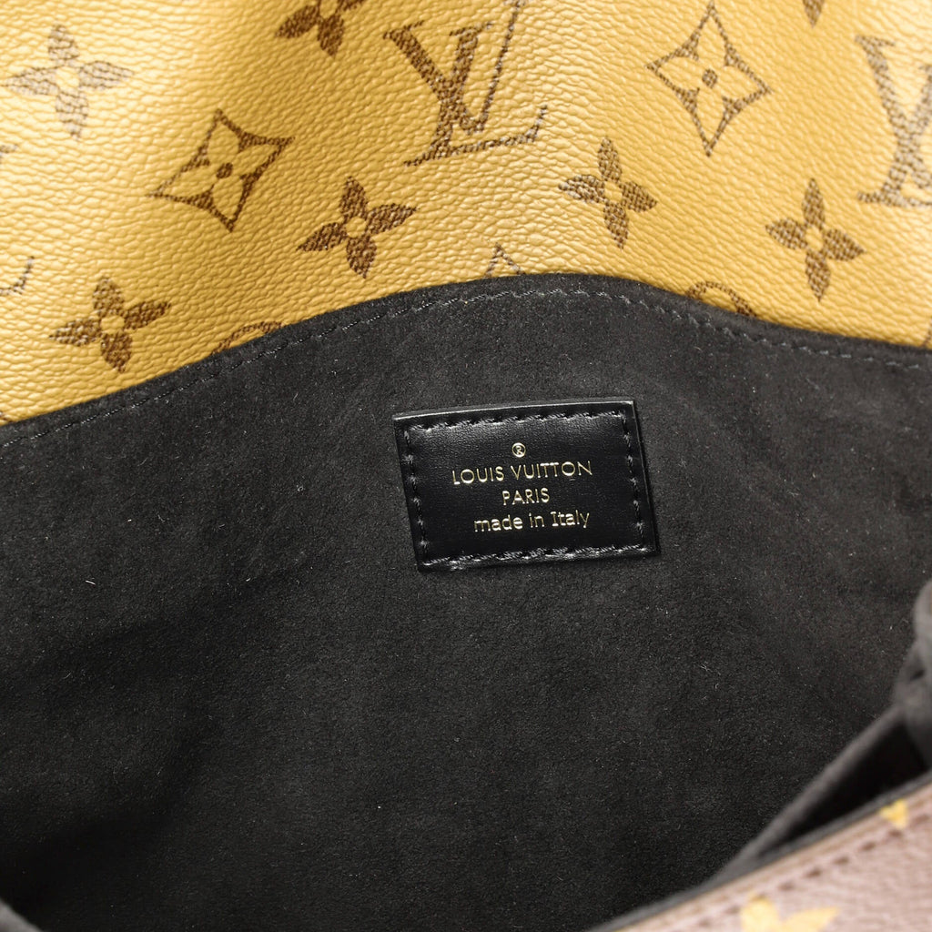 Pochette Metis Reverse Monogram Canvas