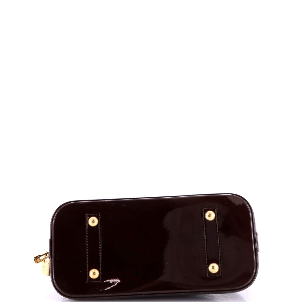 Alma Handbag Monogram Vernis PM