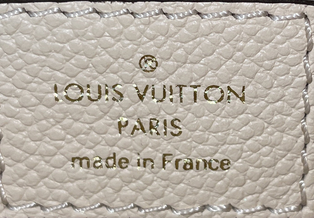 Pochette Metis Monogram Empreinte Leather East West