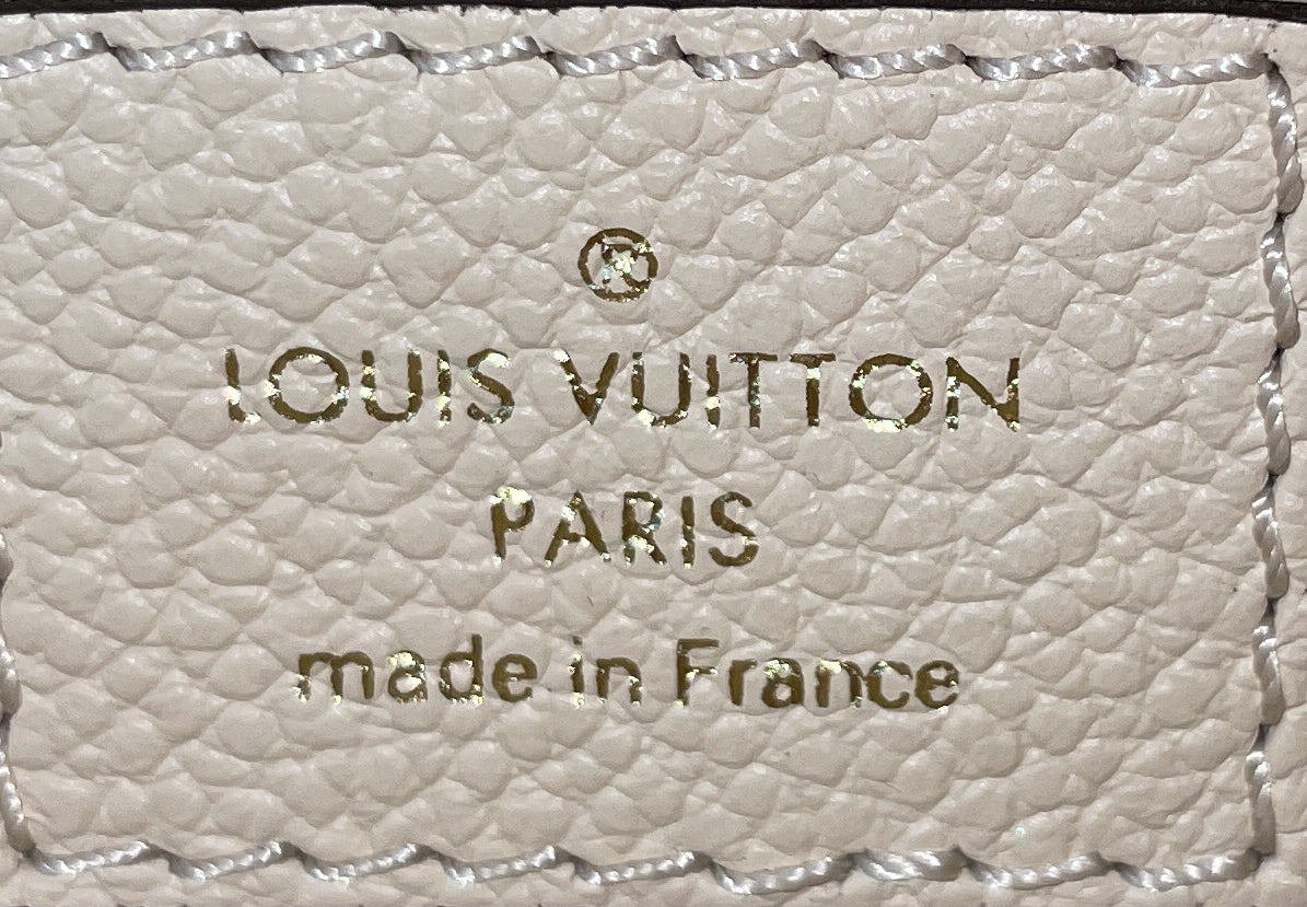 Pochette Metis Monogram Empreinte Leather East West