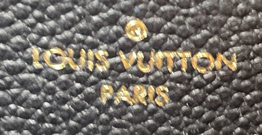 Pochette Metis Monogram Empreinte Leather East West