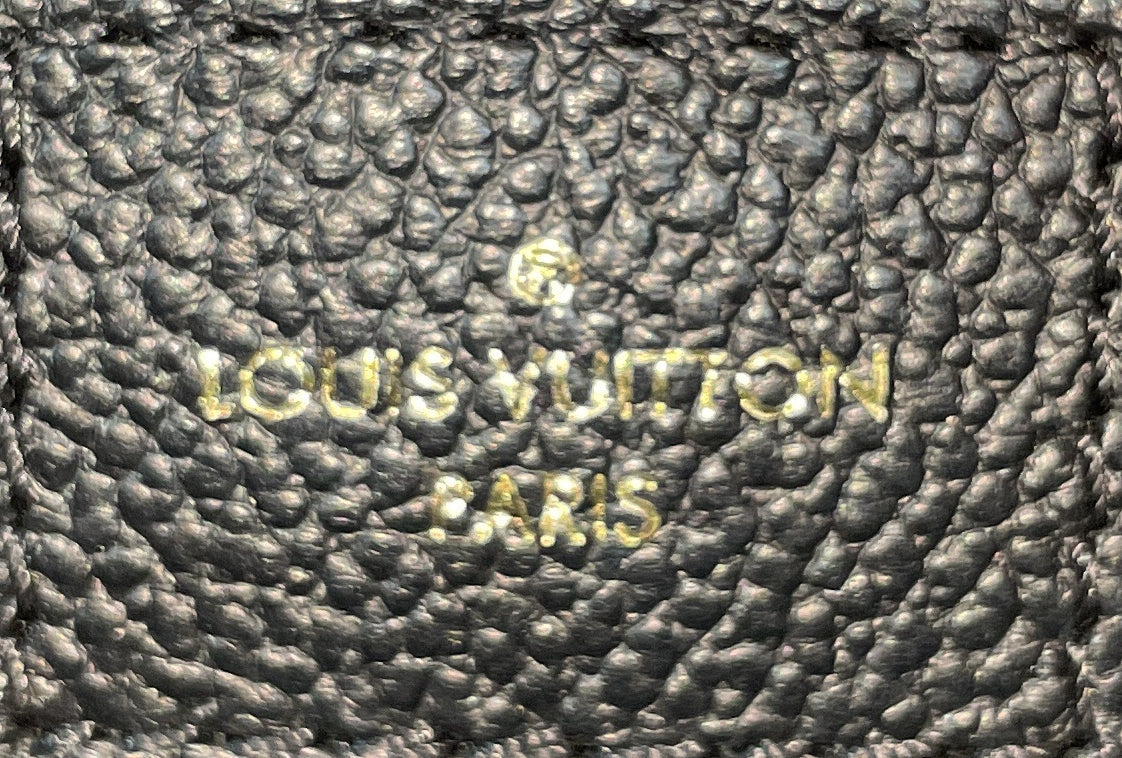 Pochette Metis Monogram Empreinte Leather East West