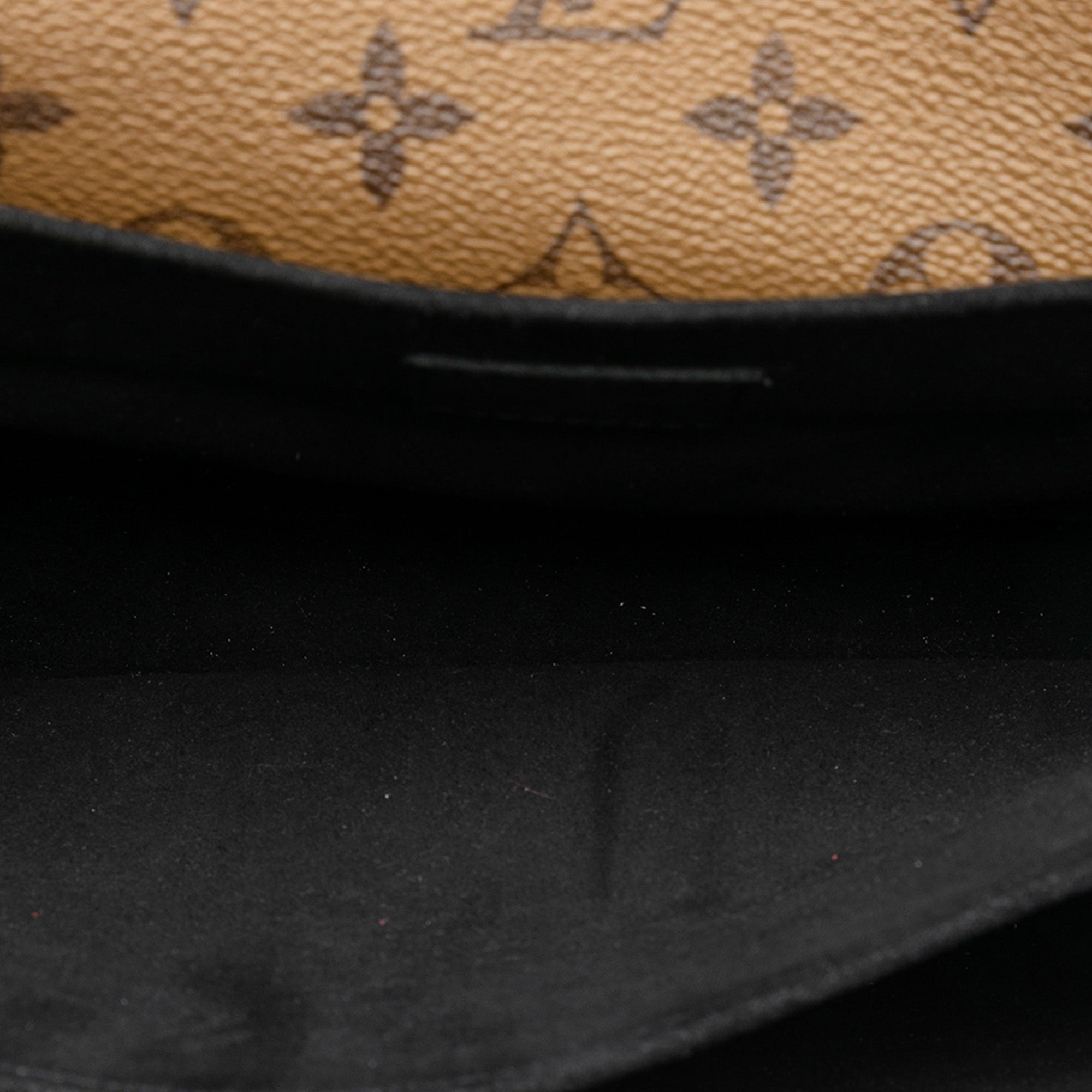 Pochette Metis Reverse Monogram Canvas