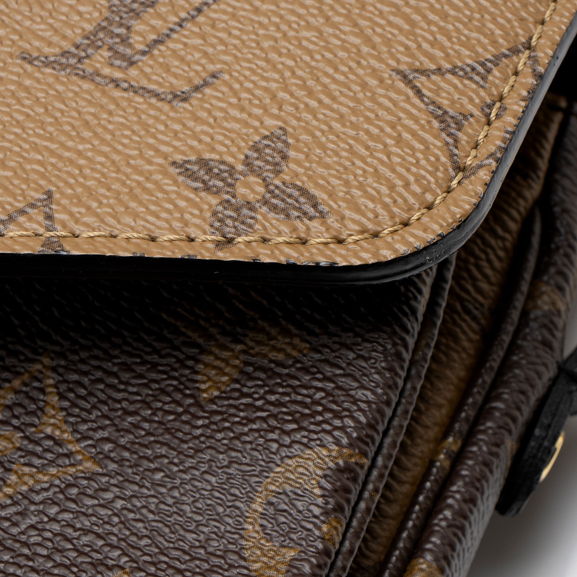 Pochette Metis Reverse Monogram Canvas