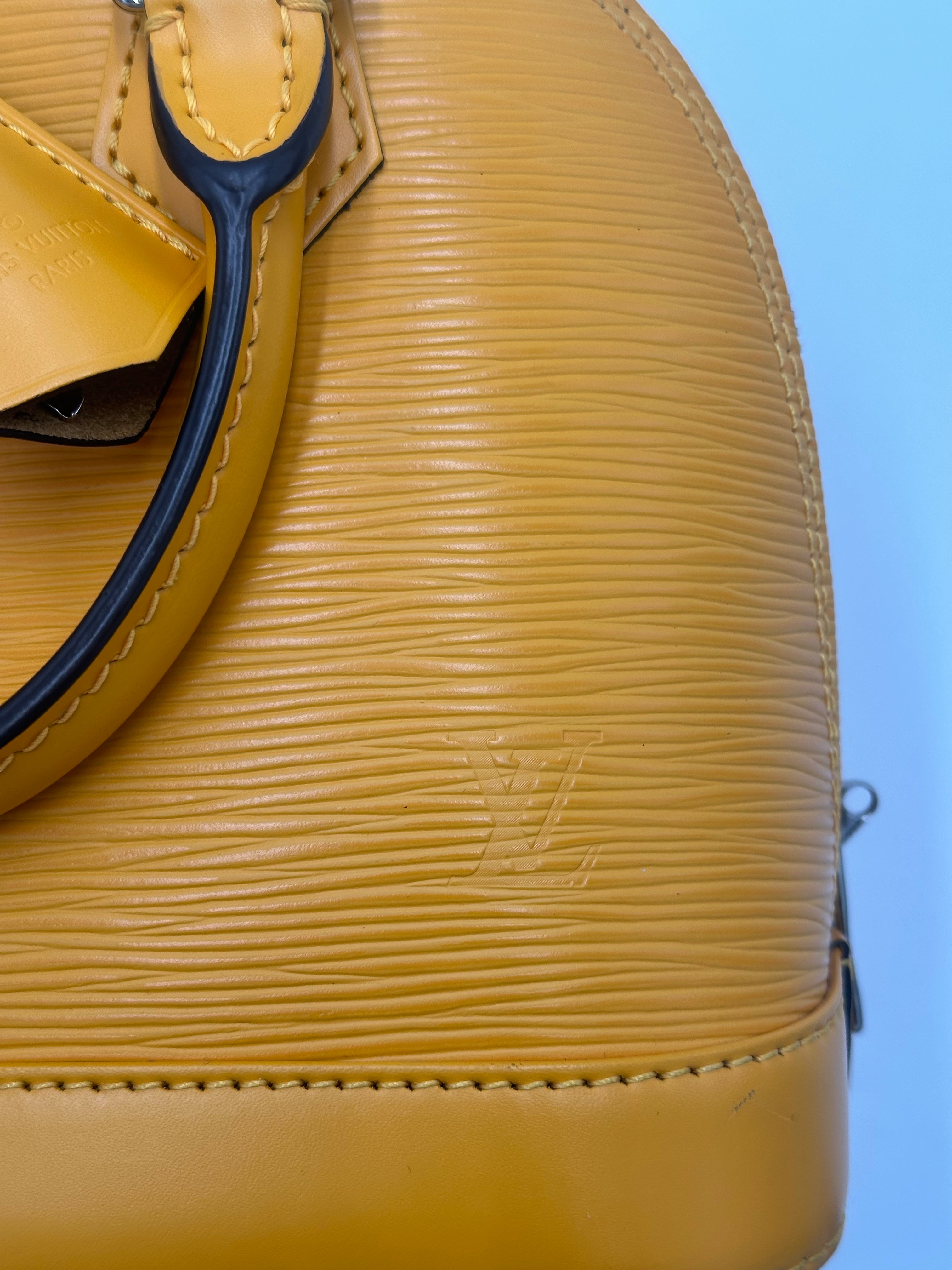 Louis Vuitton Alma Handbag Epi Leather Yellow Leather Handbag (Pre-Owned)