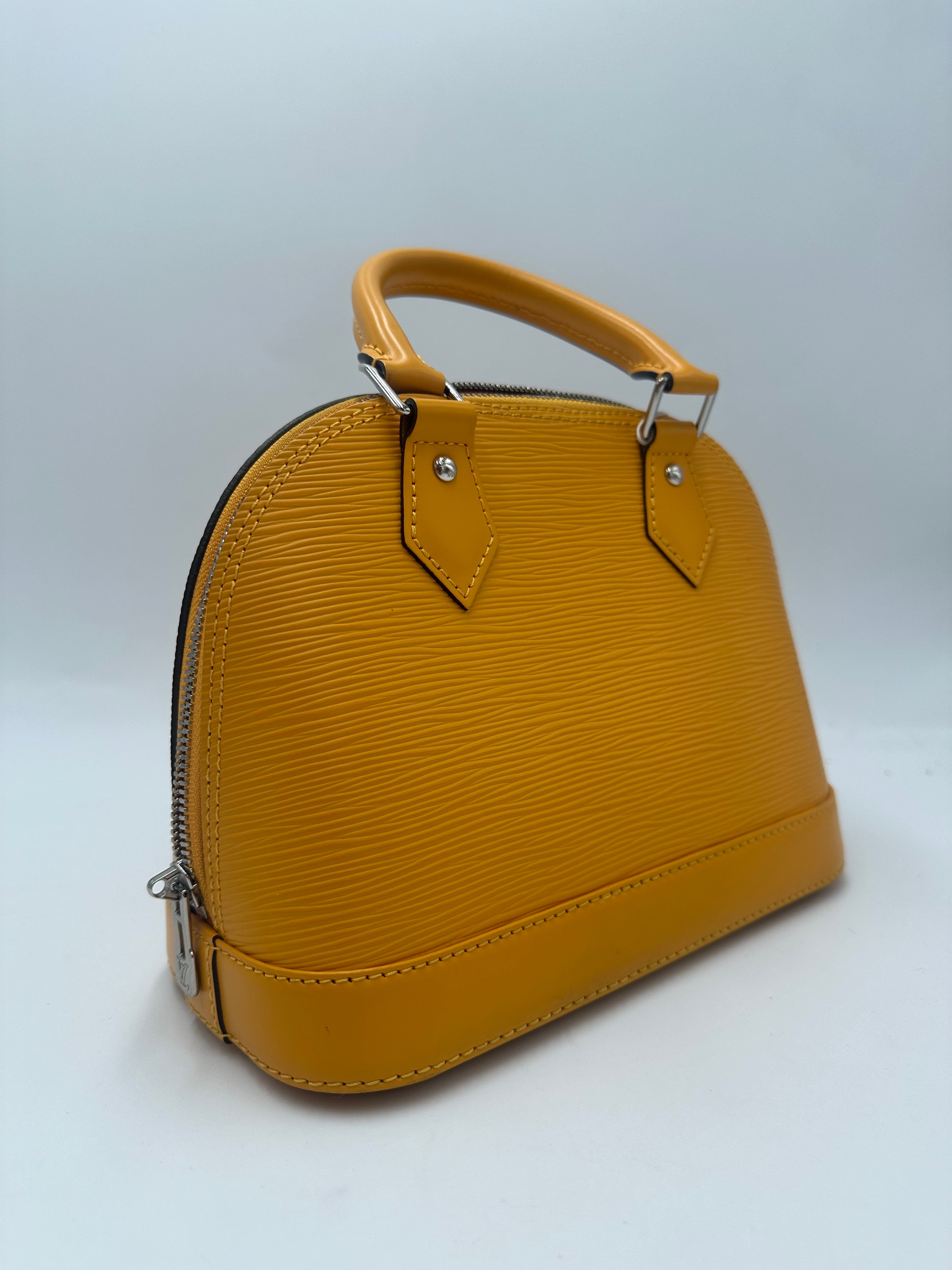 Louis Vuitton Alma Handbag Epi Leather Yellow Leather Handbag (Pre-Owned)