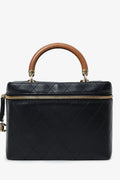 Pre-Loved Chanel™ Black Quilted Lambskin Knock On Wood Vanity Case