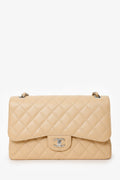 Pre-Loved Chanel™ 2016-17 Beige Caviar Leather Jumbo Double Flap Bag