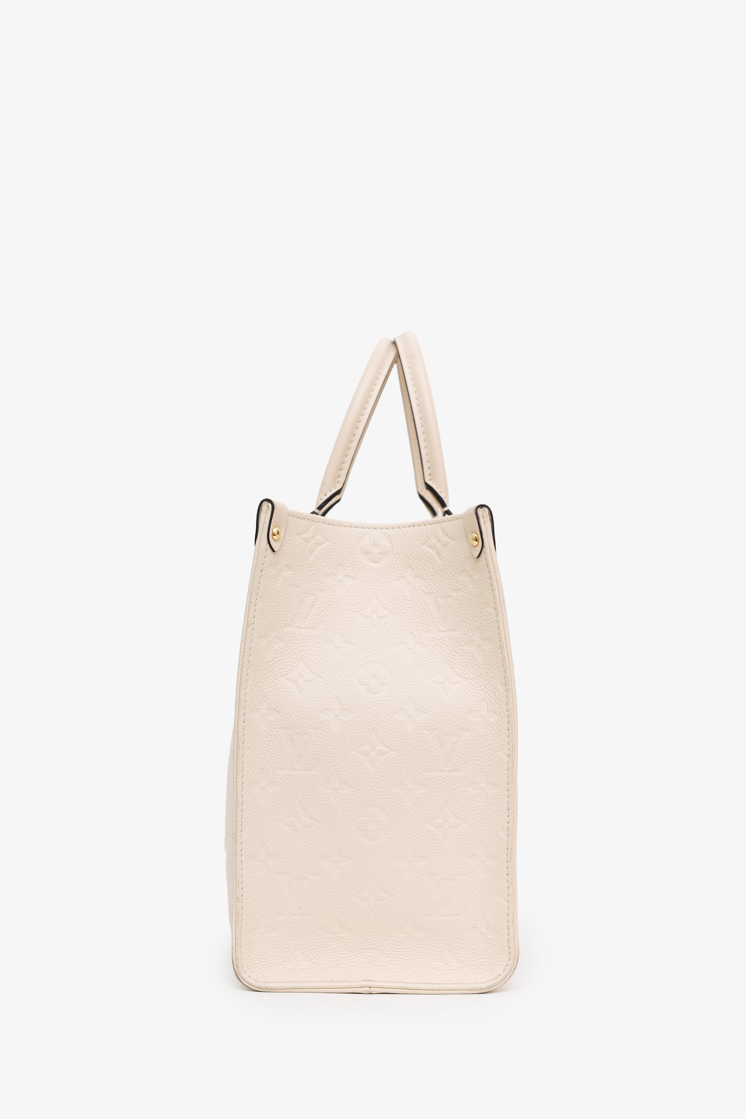 Louis Vuitton Cream Monogram Empreinte Leather OnTheGo MM