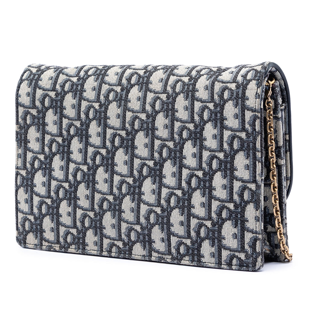 Saddle Chain Clutch Oblique Canvas