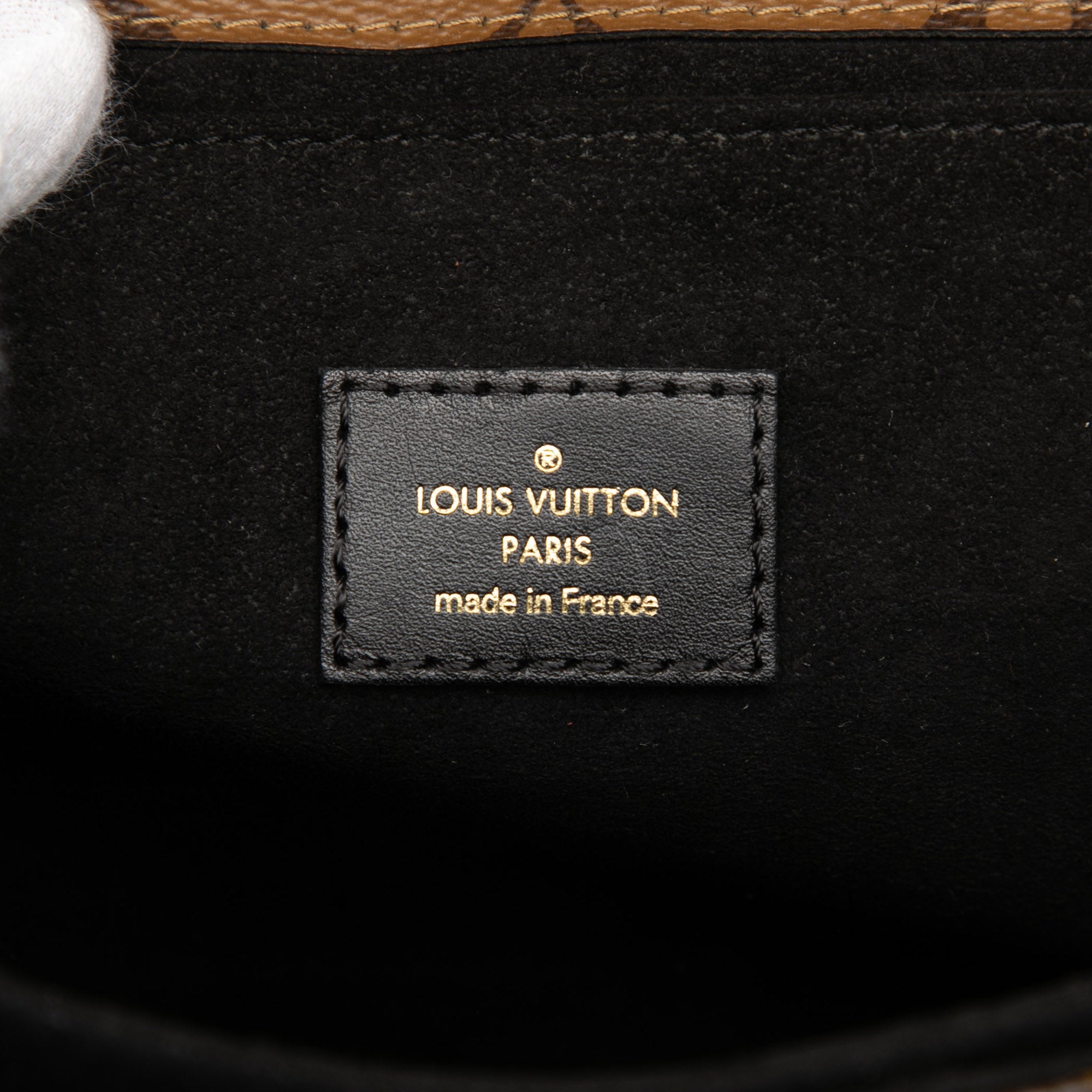 Pochette Metis Reverse Monogram Canvas