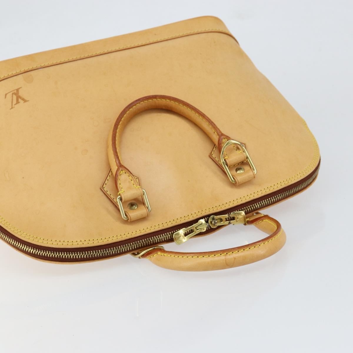 Louis Vuitton Alma Handbag Nomade Leather Beige Leather Handbag (Pre-Owned)