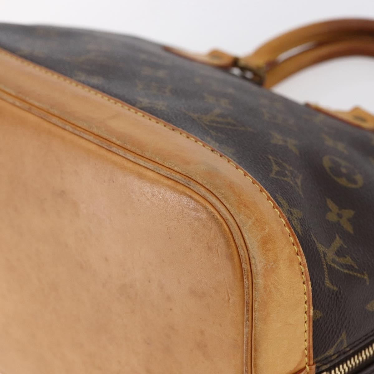 Louis Vuitton Alma Handbag Monogram Canvas Brown Canvas Handbag (Pre-Owned)