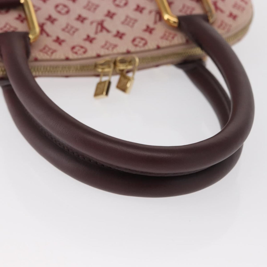 Louis Vuitton Alma Handbag Mini Lin Monogram Red Canvas Handbag (Pre-Owned)