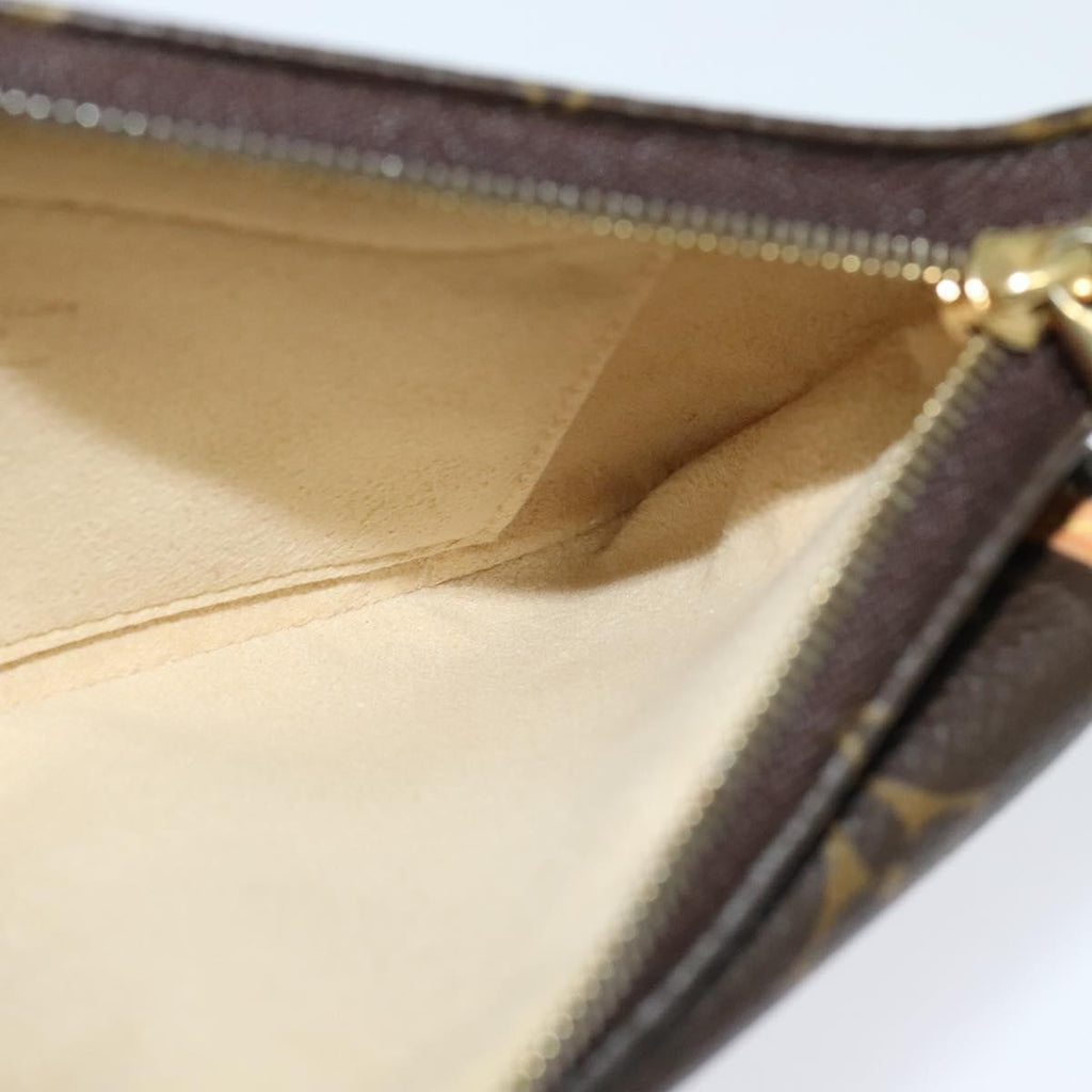 Louis Vuitton Tikal Wristlet Pochette Monogram Canvas Brown Canvas Bag (Pre-Owned)