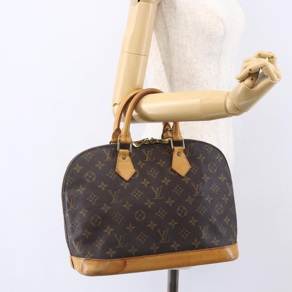 Louis Vuitton Alma Handbag Monogram Canvas Brown Canvas Handbag (Pre-Owned)