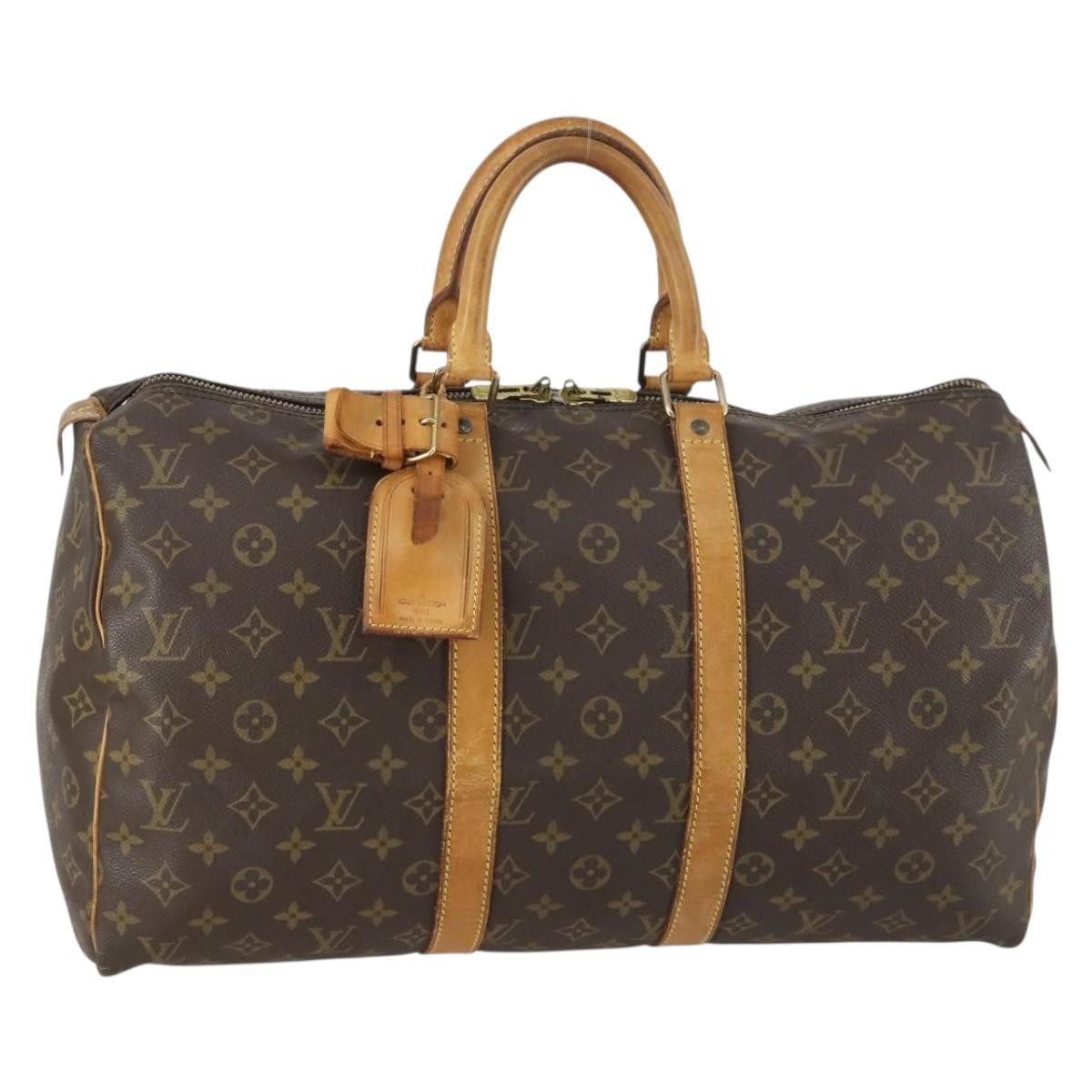 Louis Vuitton Keepall Bag Monogram Canvas Brown Canvas Travel Bag Bag (Pre-Owned)