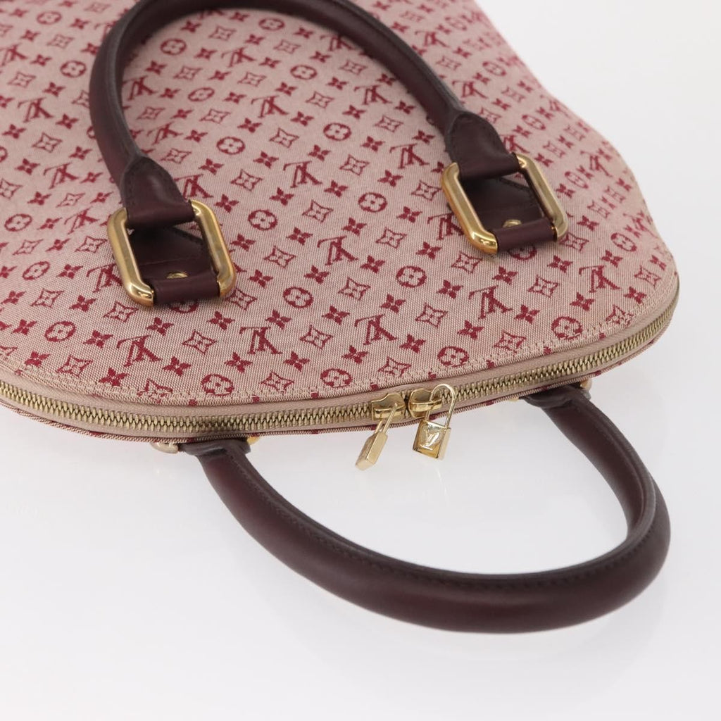 Louis Vuitton Alma Handbag Mini Lin Monogram Red Canvas Handbag (Pre-Owned)