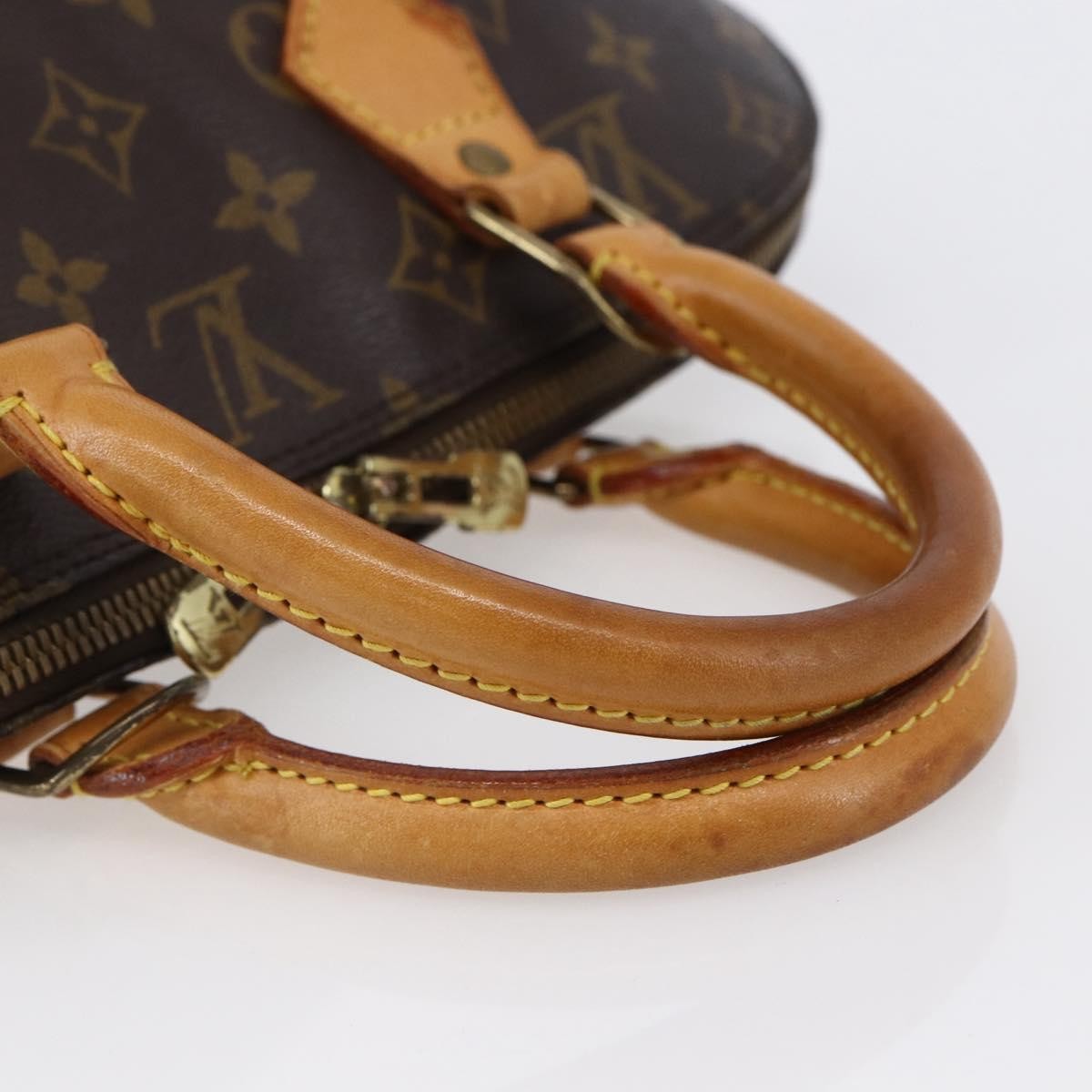 Louis Vuitton Alma Handbag Monogram Canvas Brown Canvas Handbag (Pre-Owned)