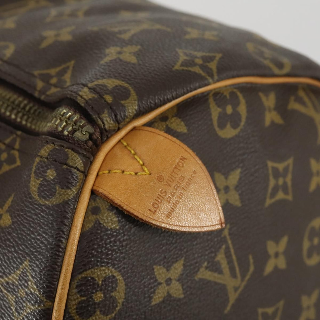 Louis Vuitton Keepall Bag Monogram Canvas Brown Canvas Travel Bag Bag (Pre-Owned)